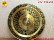 Đồng hồ mặt trống đồng và bản đồ Việt Nam.
